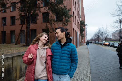 Laughing spouses on the street photo