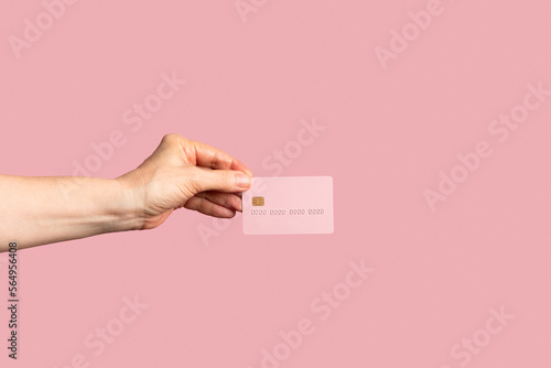 Hand holding credit / debit card photo