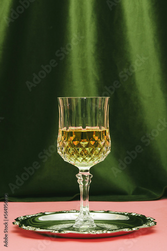 Alcoholic beverage inside goblet glass photo