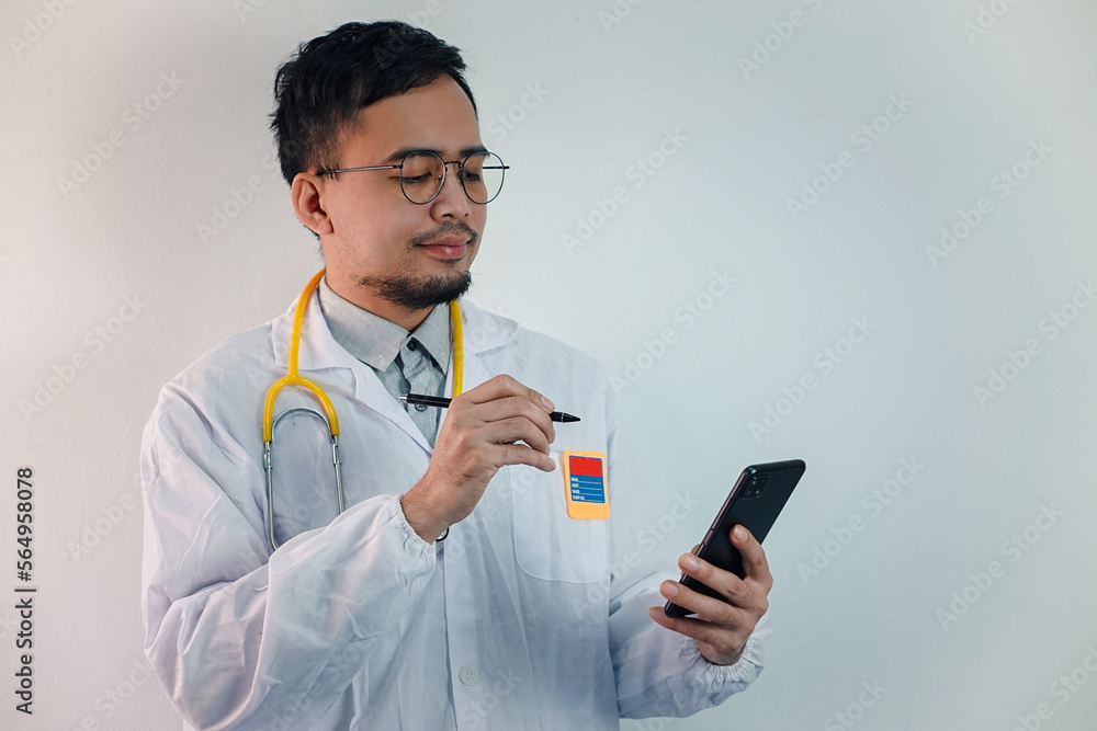 Asian man in Doctor uniform on white background in hospital
Asian man in Doctor uniform on white background in hospital