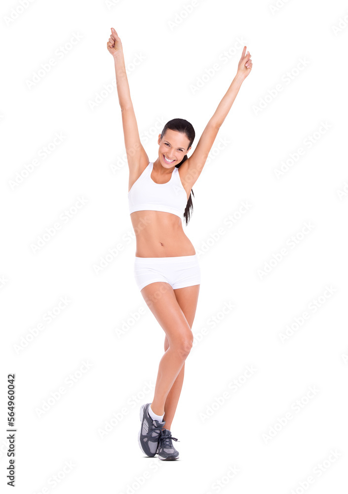 A fit young woman in exercise clothing raising her arms in celebration isolated on a PNG background.