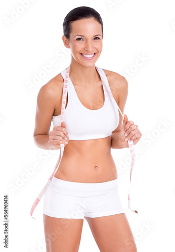 Portrait of a fit young woman with a measuring tape around her neck isolated on a PNG background. © peopleimages.com
