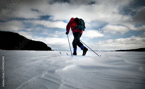 Skiing on the frozen tundra of Moosehead Lake, Maine. photo