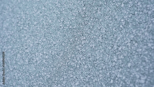 cleaning car window from frost