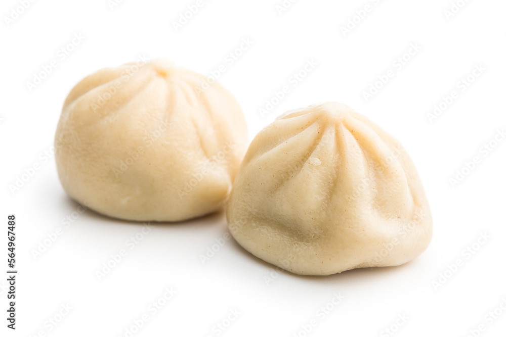 Xiaolongbao, traditional steamed dumplings. Xiao Long Bao buns isolated on white background. Xiaolongbao, traditional steamed dumplings. Xiao Long Bao buns isolated on white background.