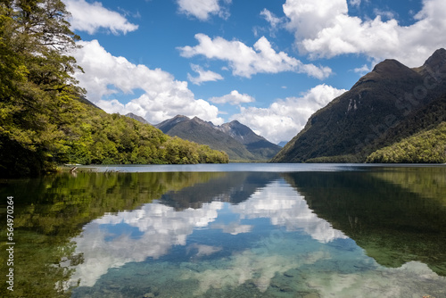 David Peaks reflected in the calm waters of Lake Gunn in the South Island of New Zealand