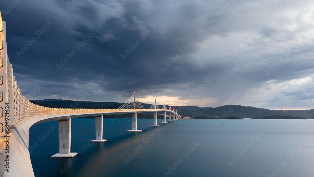 Peljesac Bridge, Croatia. Panoramic image of beautiful modern multi-span cable-stayed Peljesac Bridge over the sea in Dubrovnik-Neretva County, Croatia at sunset.