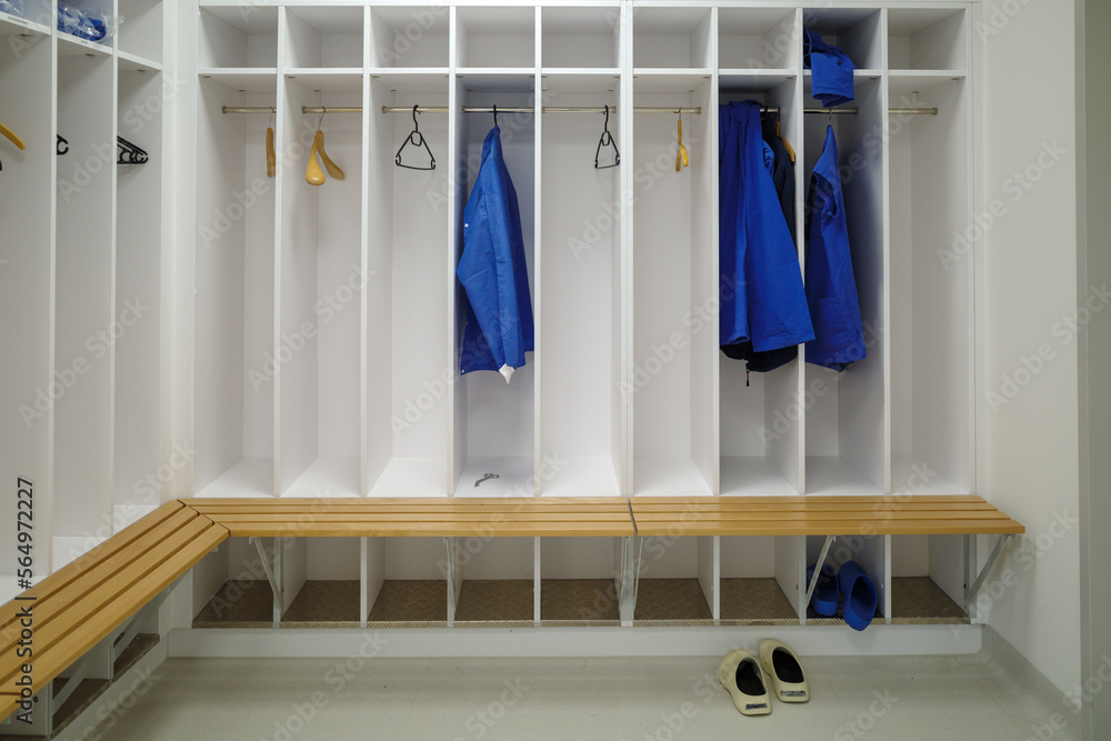 in an operating room locker room hang some blue tunic