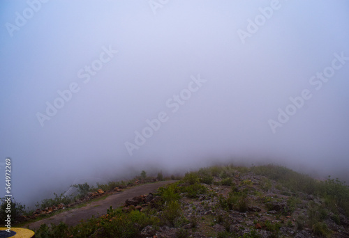 selective focus picture of mountains and clouds in the rainy season