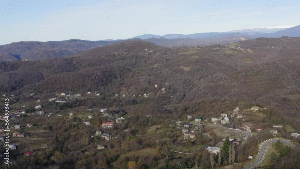 Drone of Kutaisi rural village in winter on the hills with river and houses, georgia Drone of Kutaisi rural village in winter on the hills with river and houses, georgia