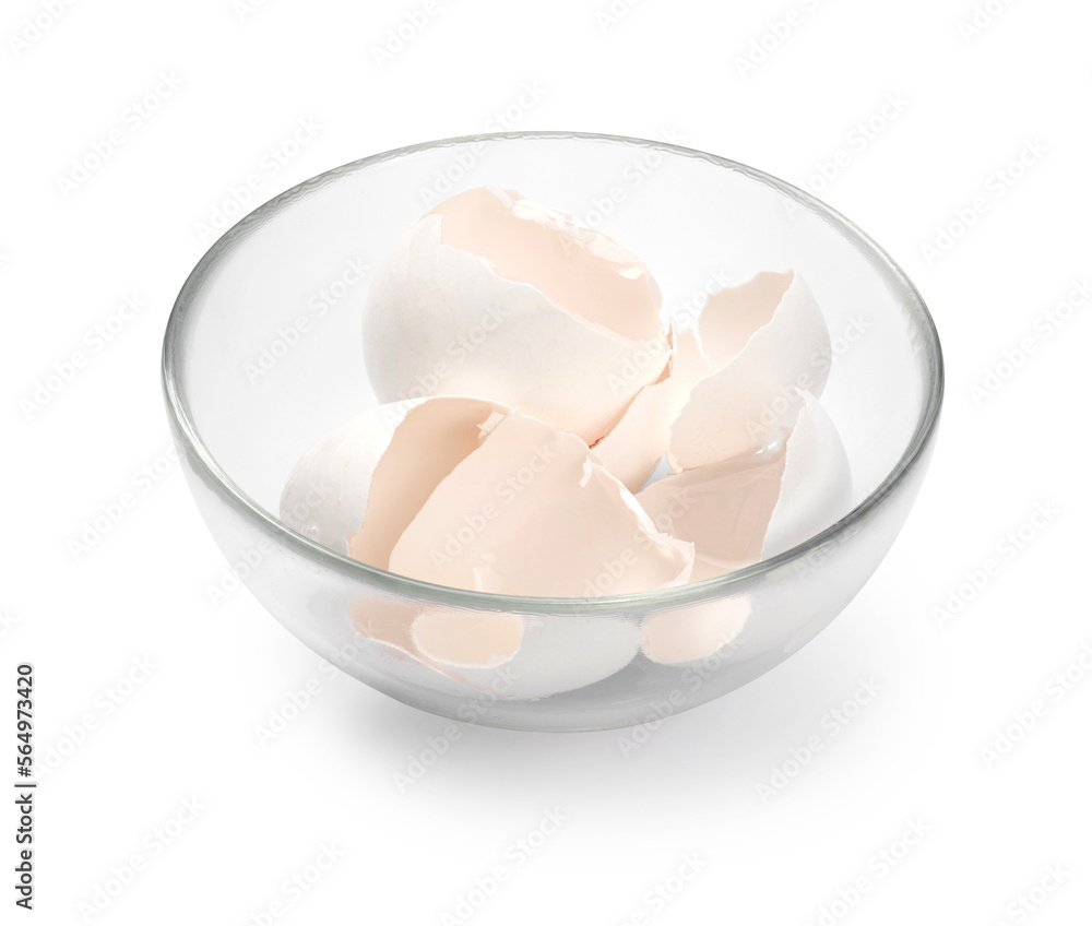 Glass bowl with eggshell isolated. Eggshell in bowl. Glass bowl with eggshell isolated. Eggshell in bowl.