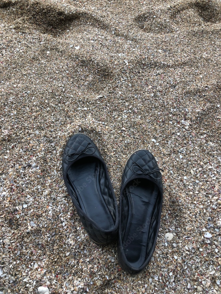 Flat shoes on the sand