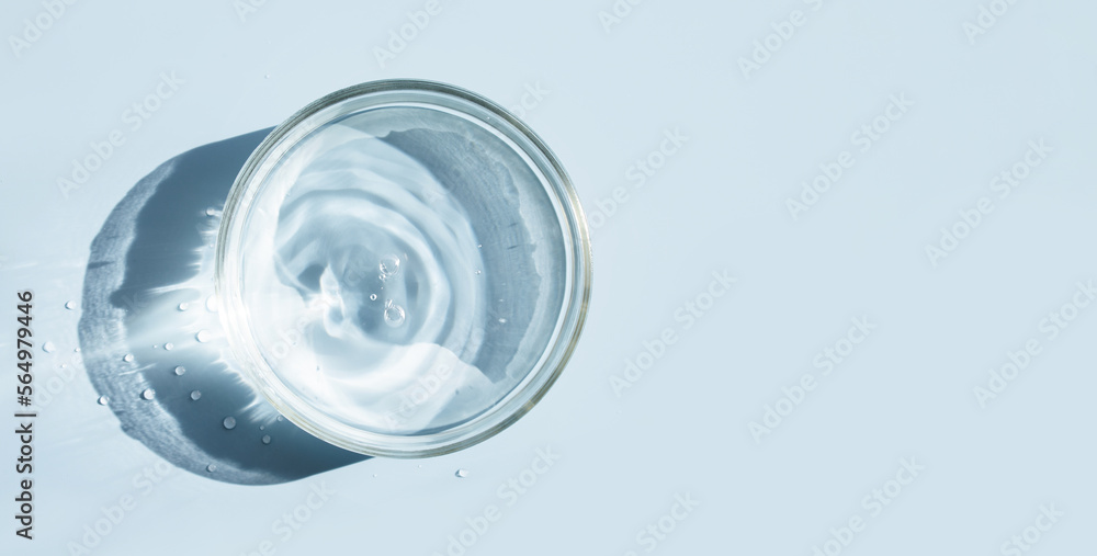 petri dish with liquid water on plain on a light background water ripple texture petri dish with liquid water on plain on a light background water ripple texture