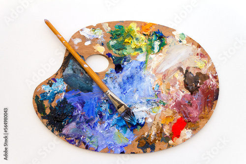 Vibrant multi-coloured artists oil paint palette