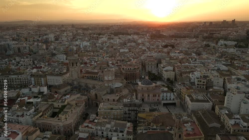 Opening Aerial view of Cathedral and Old Historic town in Valencia, Spain, during Sunset Opening Aerial view of Cathedral and Old Historic town in Valencia, Spain, during Sunset