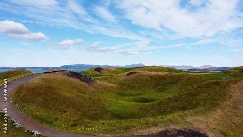 Volcanic craters in Myvatn , Iceland, aerial opening shot on sunny day Volcanic craters in Myvatn , Iceland, aerial opening shot on sunny day