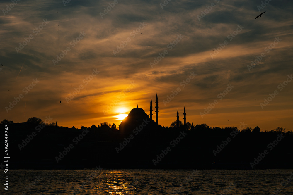 Istanbul sunset view from Golden Horn. Suleymaniye Mosque at sunset