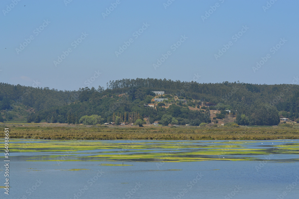 a beautiful lagoon surrounded by mountains a beautiful lagoon surrounded by mountains