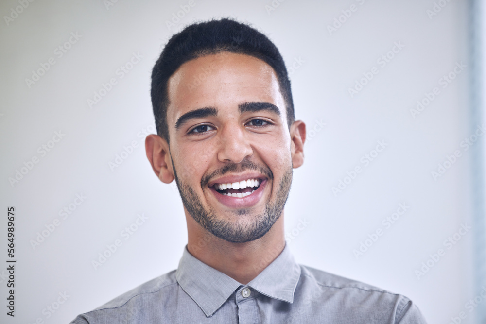 Businessman, portrait and face of a worker in a office ready for working. Happy, smile and work employee from London in creative tech designer company feeling calm in workplace with job happiness Businessman, portrait and face of a worker in a office ready for working. Happy, smile and work employee from London in creative tech designer company feeling calm in workplace with job happiness