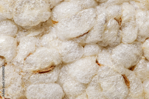 Puffed rice bread, ricecakes, background uniform texture, bunch in bulk close-up macro top view photo