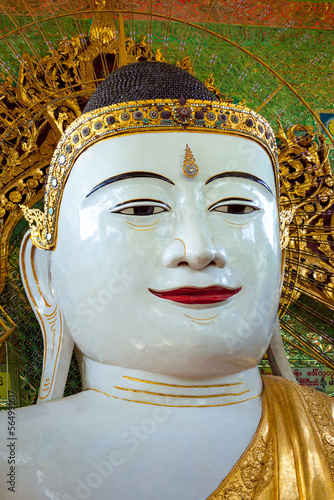 Buddha statue in the Umin Thonze Pagoda at Mandalay in Myanmar photo