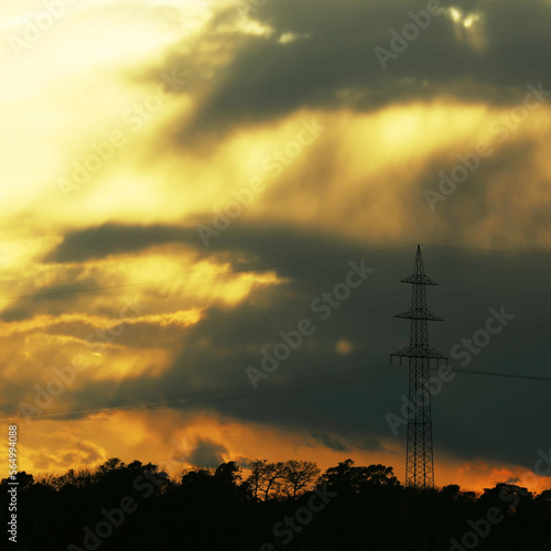 powerlines in front of dramatic sky © Jan