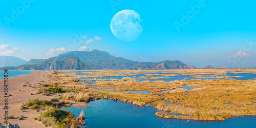 Fototapeta Naklejka Na Ścianę i Meble -  Panoramic view of iztuzu beach with full moon - Dalyan, Turkey 