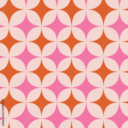 Mid Century Modern starbursts seamless pattern in pink and orange over light background. For home decor, textile and fabric.  