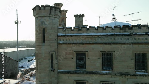 Sun peaking betwen tower of old joliet prison illinois, USA famous for prison break tv series and blues brothers photo