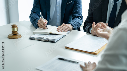Foto Businesspeople and Male lawyer consult and conference having team meeting with t