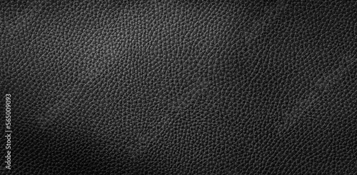 texture of black colored raw leather background 