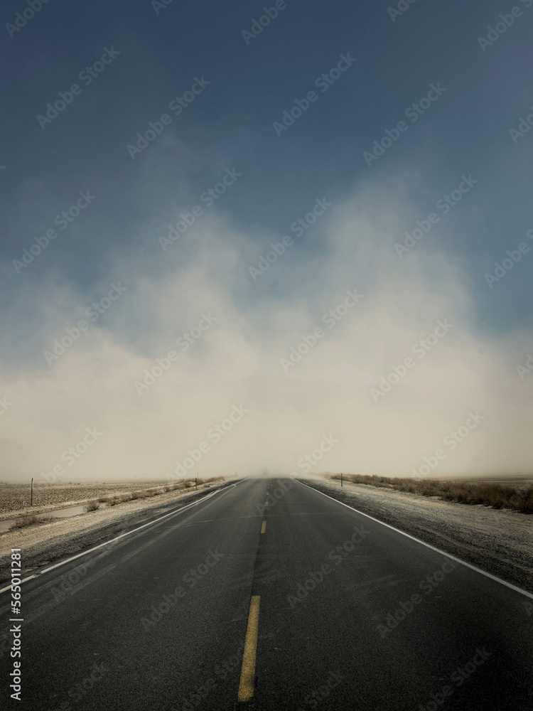 A road is covered with wind blown dust in Death Valley, California. A road is covered with wind blown dust in Death Valley, California.