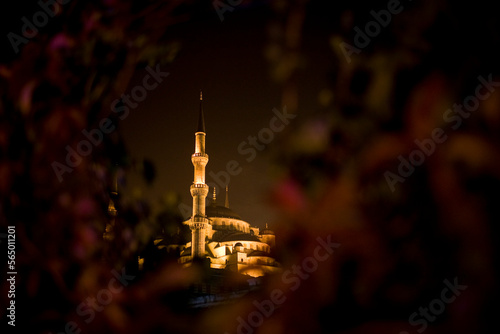 The Sultan Ahmed Mosque or Blue Mosque rises into the night in Istanbul, Turkey. photo