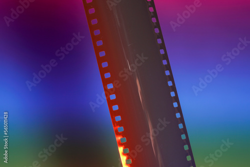 Film of an analogue camera with colorful background photographed