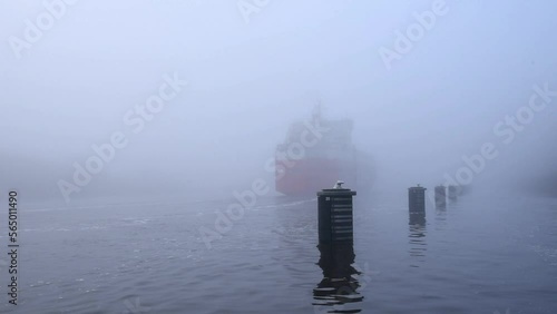 Autotransport Schiff fährt bei Nebel durch den Nord-Ostsee-Kanal  photo