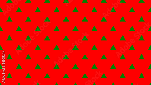 christmas gift wrapping paper with green colour triangle pattern over red useful as a background