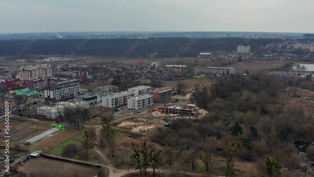 Top view of the road. Aerial view of the destroyed and burnt houses. Houses were destroyed by rockets or mines from Russian soldiers. Top view of the road. Aerial view of the destroyed and burnt houses. Houses were destroyed by rockets or mines from Russian soldiers.
