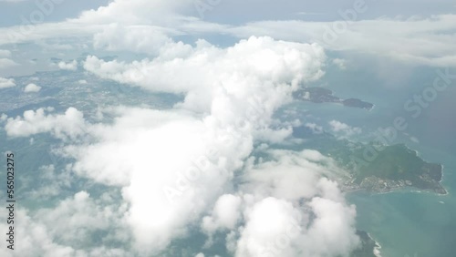 view from inside airplane airasia while flying over cloud on sky photo