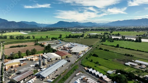 Industrial Buildings And Fields At Daytime In Abbotsford, British Columbia, Canada. - aerial photo
