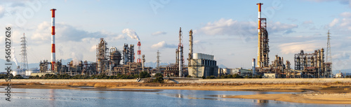 Ultra wide image of the petrochemical complex at Yokkaichi Port, Yokkaichi city, Mie prefecture, Japan at daytime.	 photo