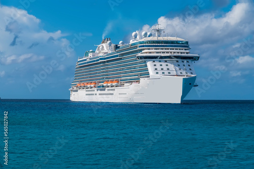 Fototapeta Naklejka Na Ścianę i Meble -  A view of a cruise ship moored on the island of Eleuthera, Bahamas on a bright sunny day