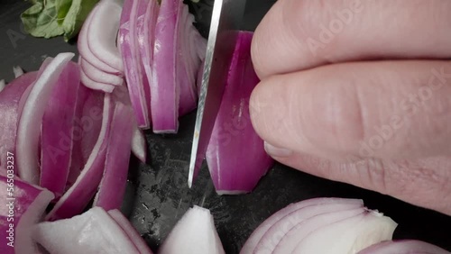 Wallpaper Mural A chef is slicing a yellow pepper on a cutting board.The chef is carefully cutting it into thin slices for a ceviche recipe. Torontodigital.ca