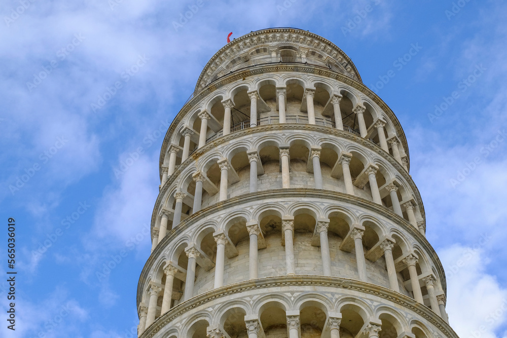 leaning tower of Pisa from beneath across the blue sky. Travel to Tuscany, Italy. 