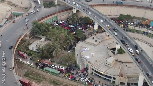 Aerial View Of Jinnah Flyover Over Rotary Food Park In Karachi. Dolly Ascending Shot photo