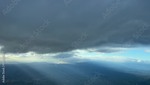 Pilot poiint of view from a jet cockpit while flting under a grey layer of stratus, SE Spàin, 6000m high. 4k photo