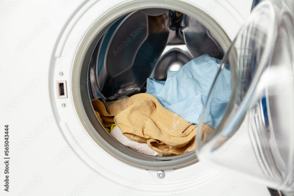 Dirty laundry inside the washing machine....
