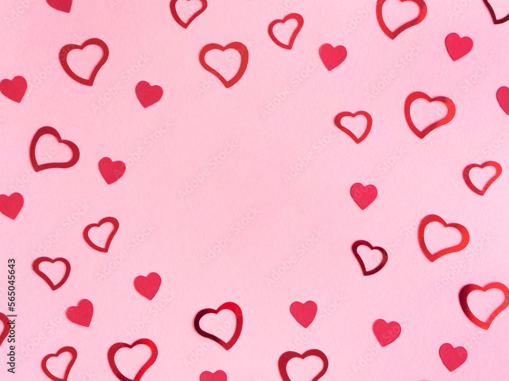 Pink valentines day background with different hearts.