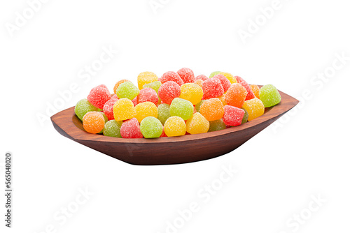 Gum bullets also called jelly beans. Sweets typical of the Junina Party in Brazil. Traditional Brazilian food in wooden bowl, sweet festa junina. White background for clipping. Without shadow