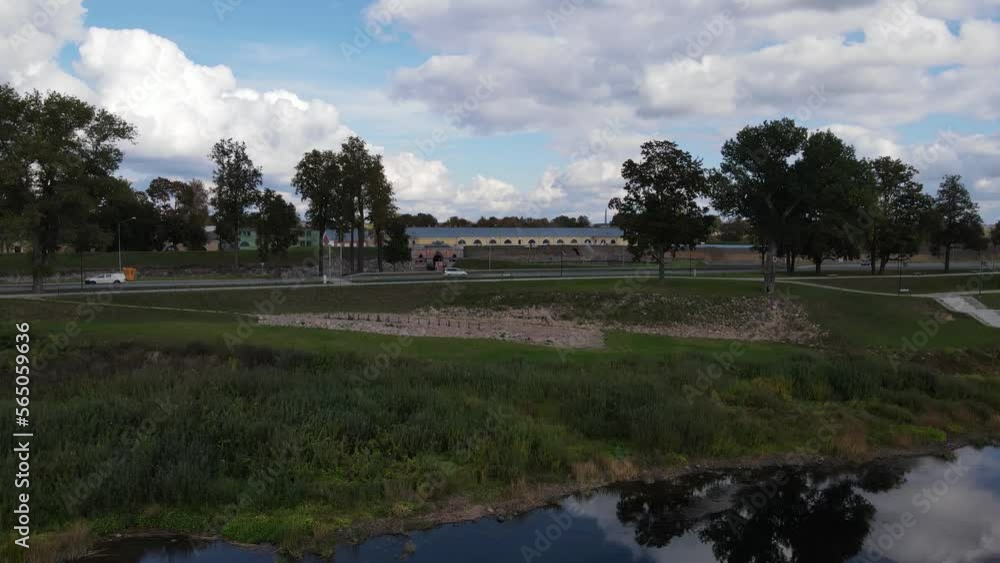 Drone is flying towards Daugavpils in Latvia, beautiful city near Daugava river Drone is flying towards Daugavpils in Latvia, beautiful city near Daugava river