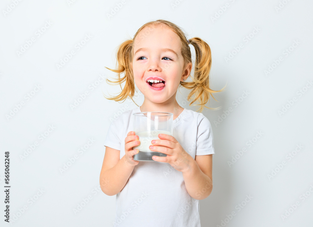Image of child drinking milk on white background Image of child drinking milk on white background